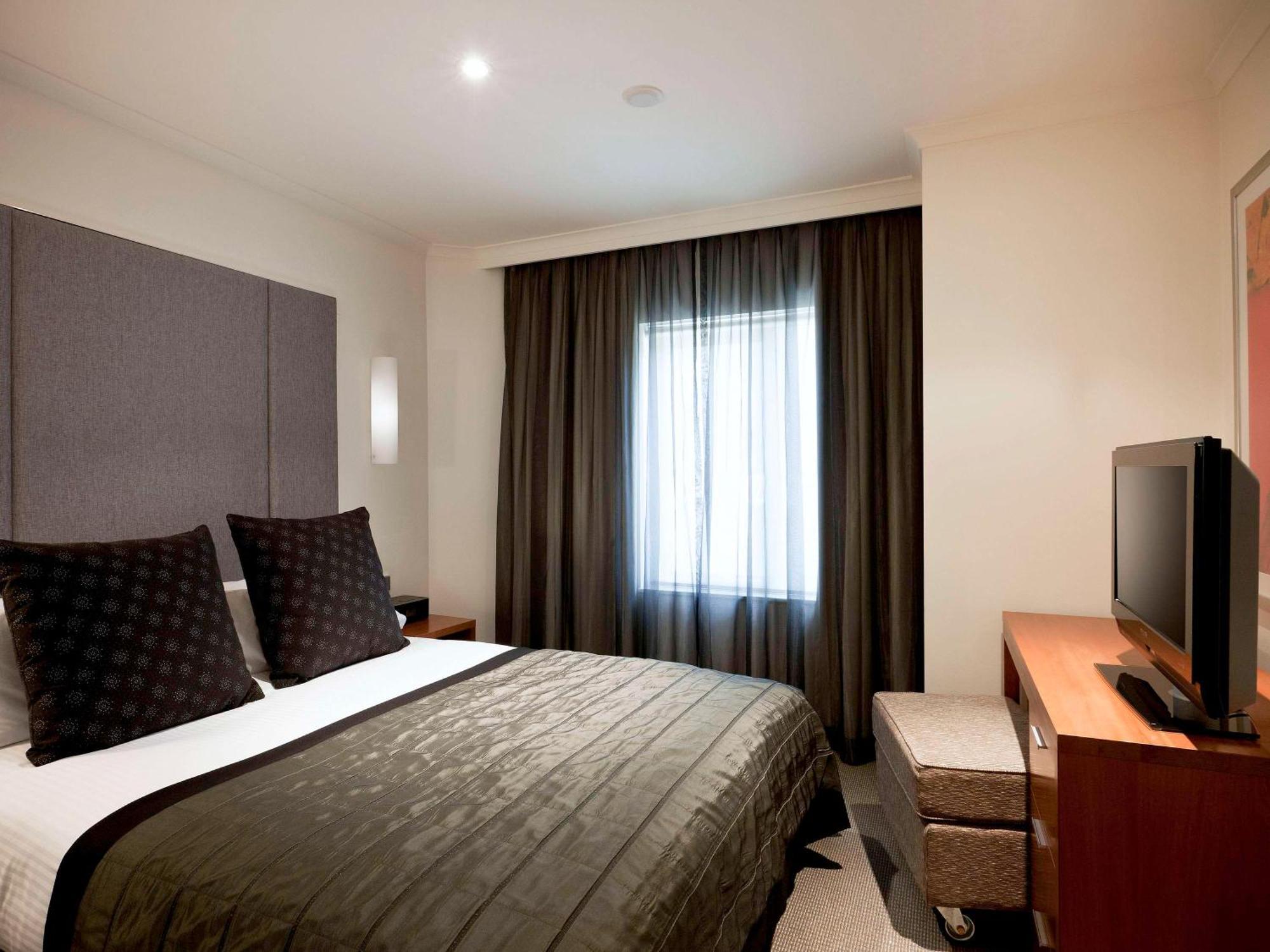 The Sebel Quay West Suites Sydney Sidney Exterior foto A bedroom at the hotel